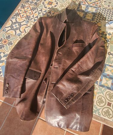 Veste homme en cuire maron, automne hivers. Etat impeccable.