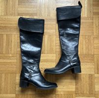 Black leather knee high boots