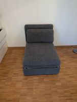Grauer IKEA Schlafsessel -- ausziehbar