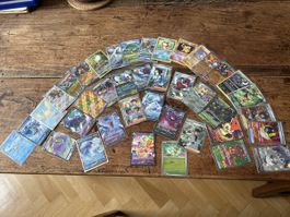 Lot de 40 cartes Pokémon diverses en pochettes