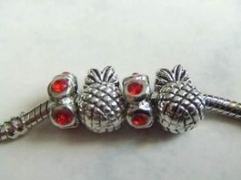 Strass Perle rot vergoldet, platiniert
