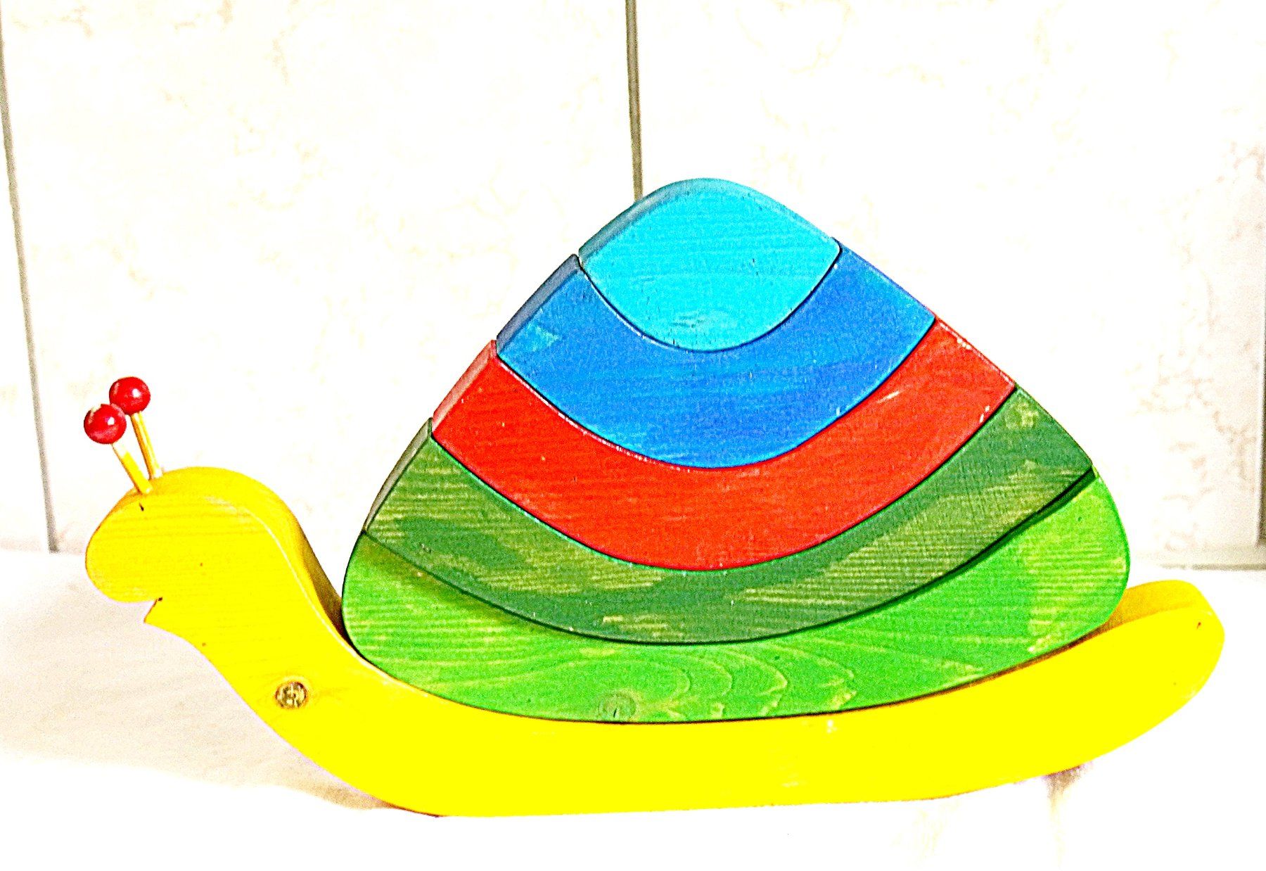 Giocattoli: Holzschnecke Regenbogenfarbe – Usato da Baar venduto da 2cvbaar