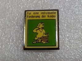 Ansteckpin 296: Förderung des Kindes