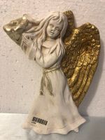 Figurine murale ange en céramique
