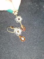 Elegante Ohrringe mit Strass und goldenen Details, neuwertig