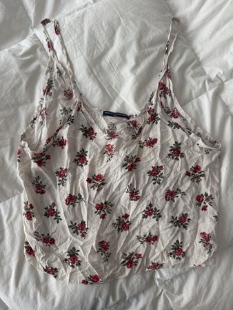Débardeur Brandy Melville blanc à fleurs taille U état bon