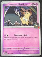 Pokemon Team Rocket’s Mimikyu 087/182 DRI