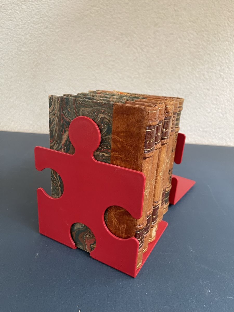 Altro in Decorazioni & Accessori: 4 Buchstützen rot Puzzle Design – Usato da Bonstetten venduto da usgsuechts_vintage 4