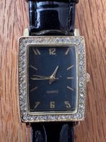 Armbanduhr Quarz goldfarben schwarz gebraucht Zustand