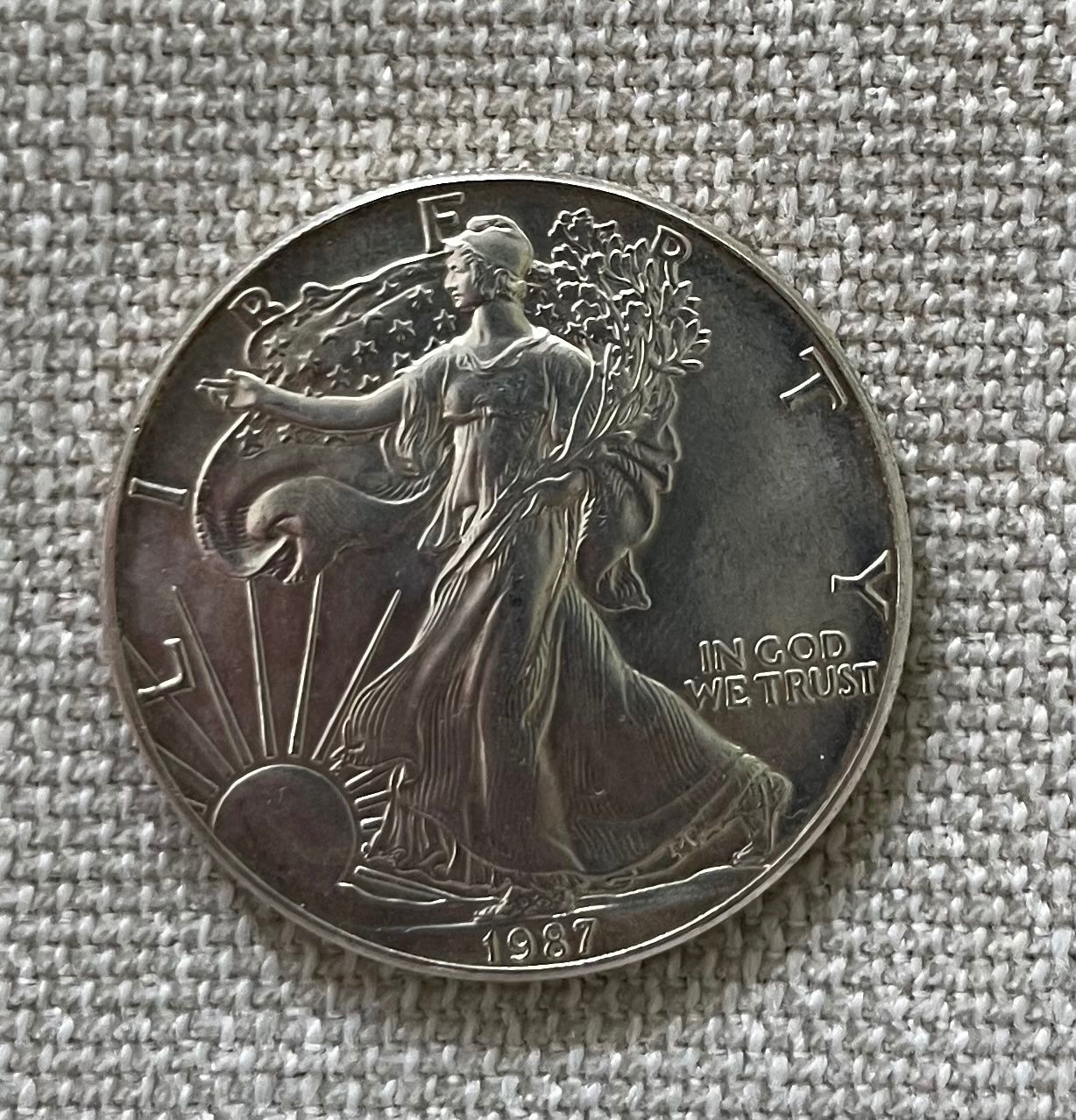 Toutes les monnaies: American Silver Eagle 1 Unze Feinsilber 1987 – Neuf (Voir description) à Ennetbürgen par Peter12345