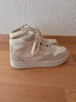 Weisse Sneaker