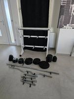 126 kg Gewichtescheiben und hantlen