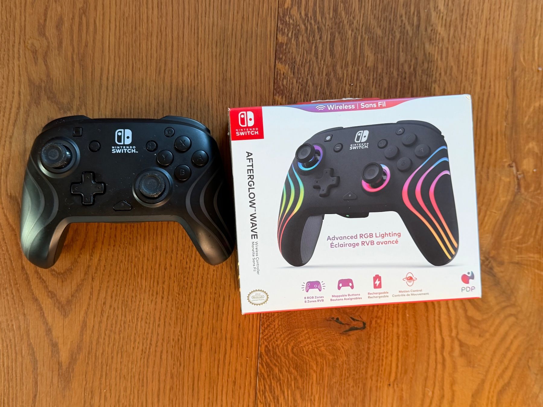 Nintendo Manettes: PDP Afterglow Wave Controller Nintendo Switch neuwertig – D'occasion à Sils im Domleschg par GabrielaF02
