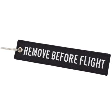 Portachiavi: Schlüsselanhänger REMOVE BEFORE FLIGHT schwarz – Nuovo e nell'imballaggio originale da Bern venduto da aeroshop.ch