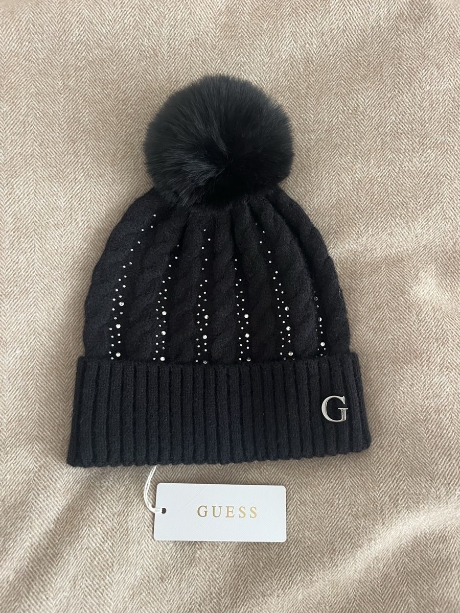 Guess Copricapi, berretti & cappellini: Bonnet Guess noir – Nuovo e nell'imballaggio originale da Neuchâtel venduto da Ariane_vn00