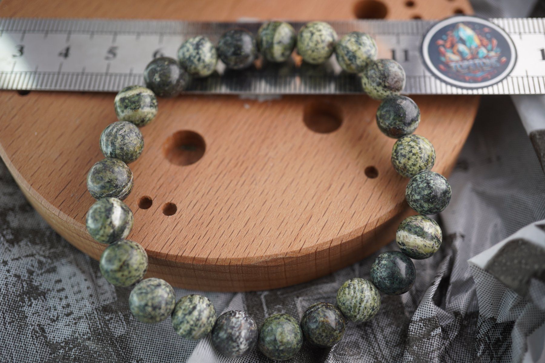 Minerali & Pietre curative: Serpentinit    Kugel    Armband     Rausverkauf – Nuovo e nell'imballaggio originale da Eschenbach SG venduto da topstone
