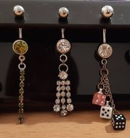 Diverse Bauchnabelpiercings