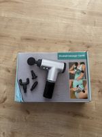 Massagepistole silber mit Zubehör in Originalbox