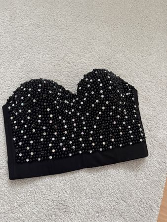 Corsage schwarz mit Perlen