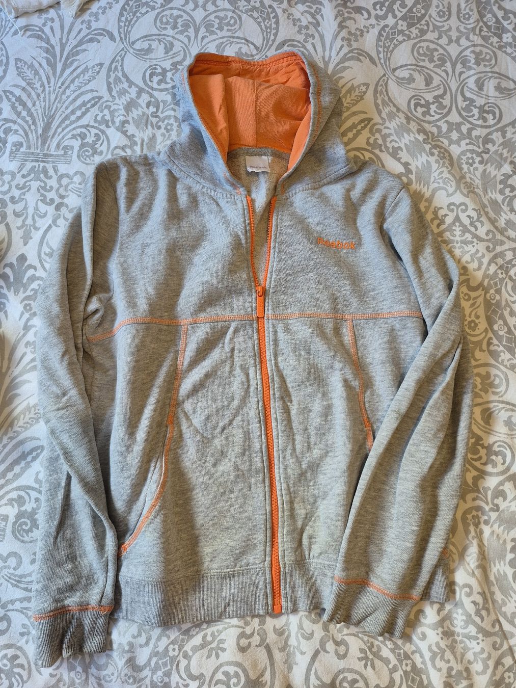 Giacche: Sweat à capuche Reebok gris orange fermeture éclair taille S – Usato da St-Pierre-Clages venduto da _RV 1