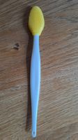 Brossette de nettoyage pour menton de chat.