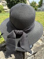 Schöne schwarze Sonnenhut mit Schleife Grösse verstellbar