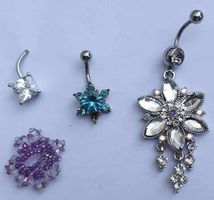 Lot de piercings pour nombril jamais portés