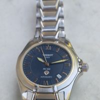 Montre Tissot PR 100 Autoquartz, acier/COURONNE DORE,vintage