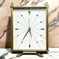 Réveil mécanique suisse BUCHERER 8 jours bronze plaqué or