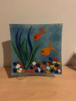 Glasdeko mit Fischmotiv