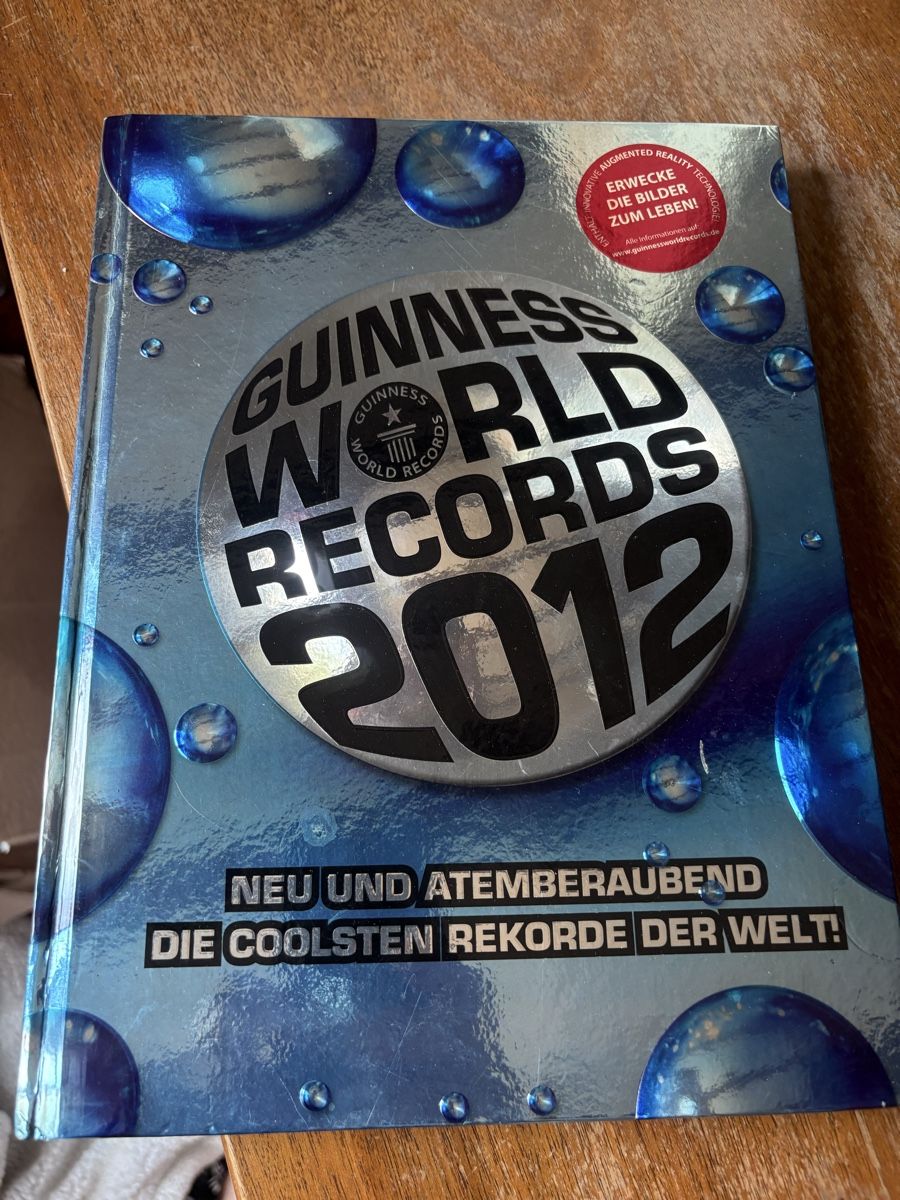 Livres: 2012 Guinness World Record Buch – D'occasion à Obermumpf par davetattoo