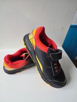 Coole orange-schwarze Kinderschuhe, Grösse 34