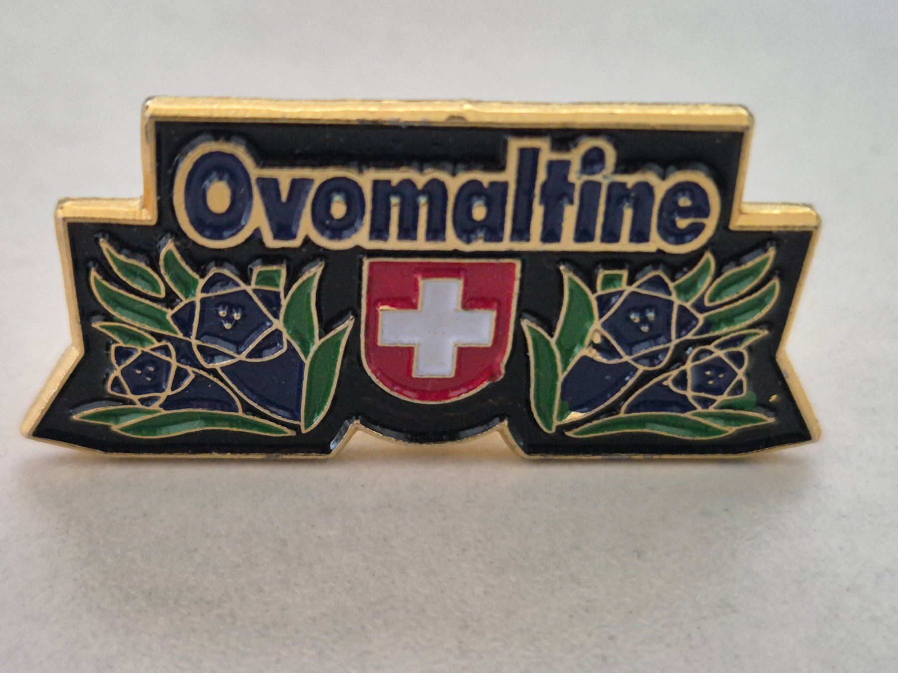 Swiss Placchette & Badge: Ovomaltine    -     Pin – Usato da Niederweningen venduto da Obson