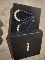 Boucle d’oreille Chanel perles bleues et blanches bon état