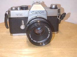 Appareil photo argentique Canon TX avec objectif 50mm 1:1.8