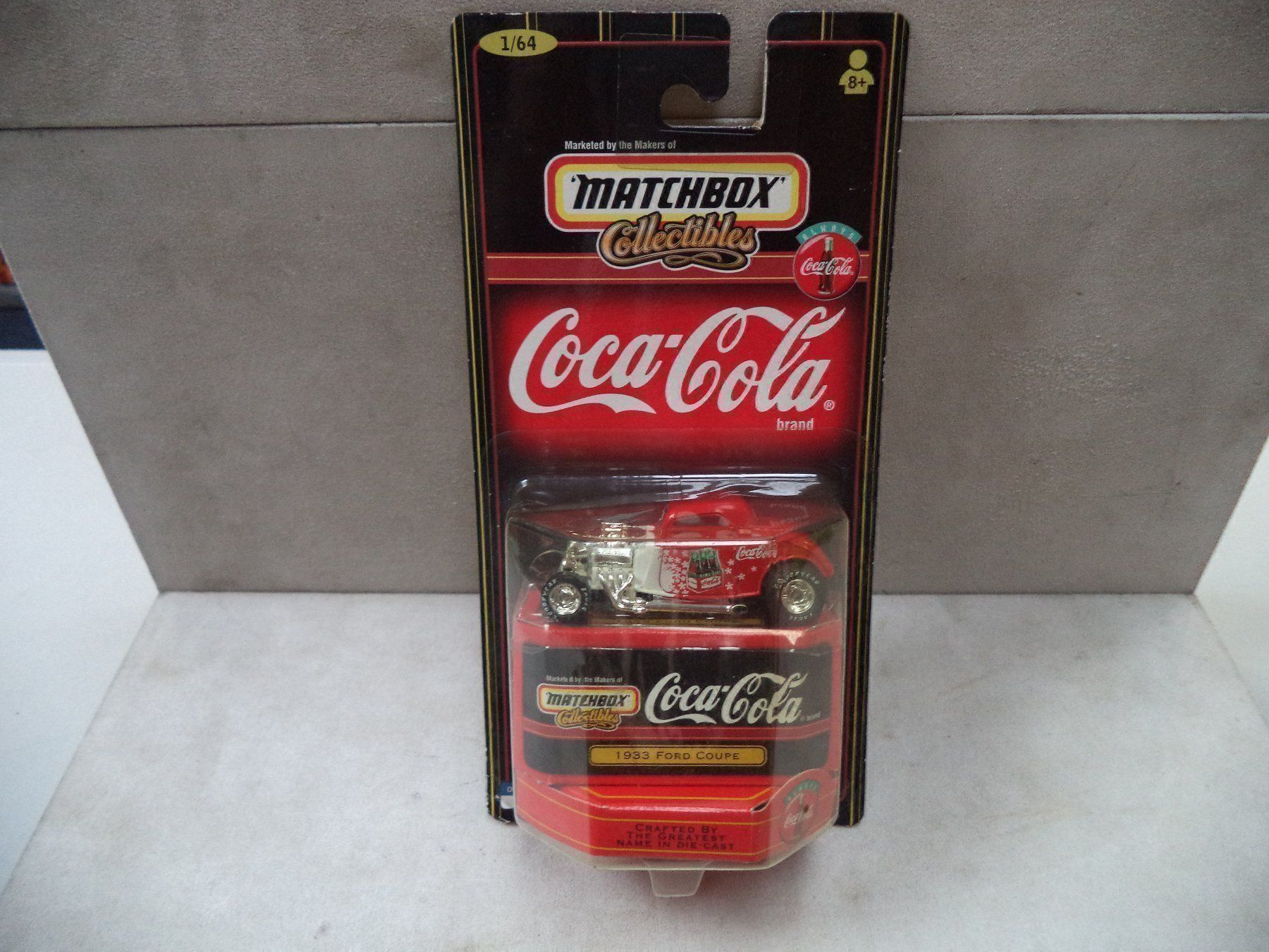 Modellini d'auto: MATCHBOX Coca Cola 1933 Ford Coupe – Nuovo e nell'imballaggio originale da Rieden AG venduto da Wirth03