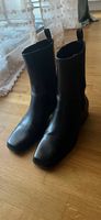 Schwarze Stiefel ohne Absatz 40