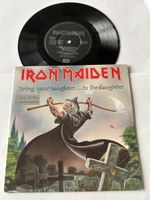 Iron Maiden. 1990. Bring your daughter….to the Slaughter