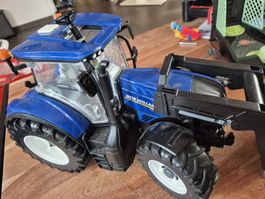 Bruder New Holland Traktor mit Frontlader - Top Zustand!
