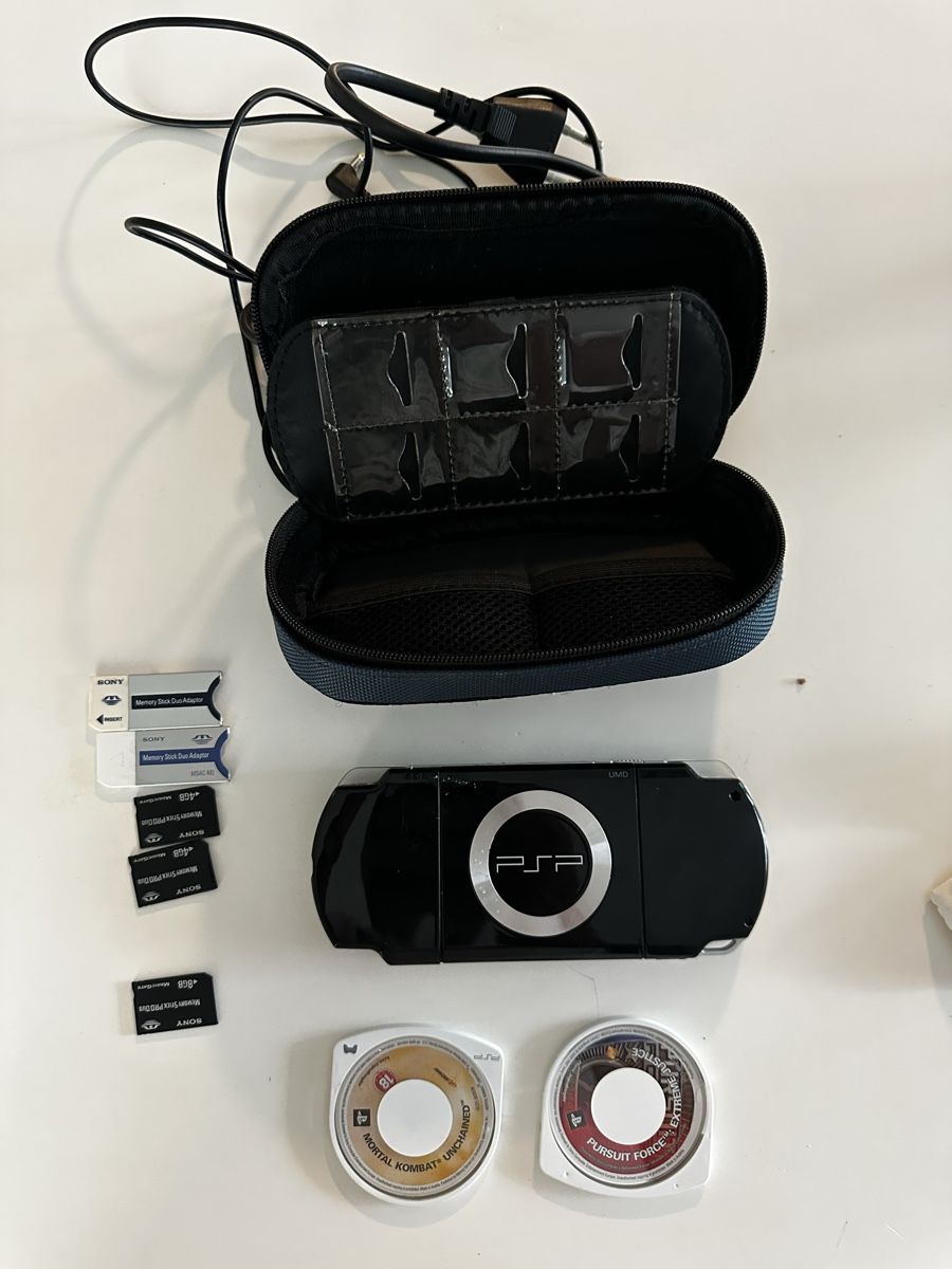 Sony Console: Console PSP 2004 noire avec accessoires et jeux – Usato da Sion venduto da Alfi74 1