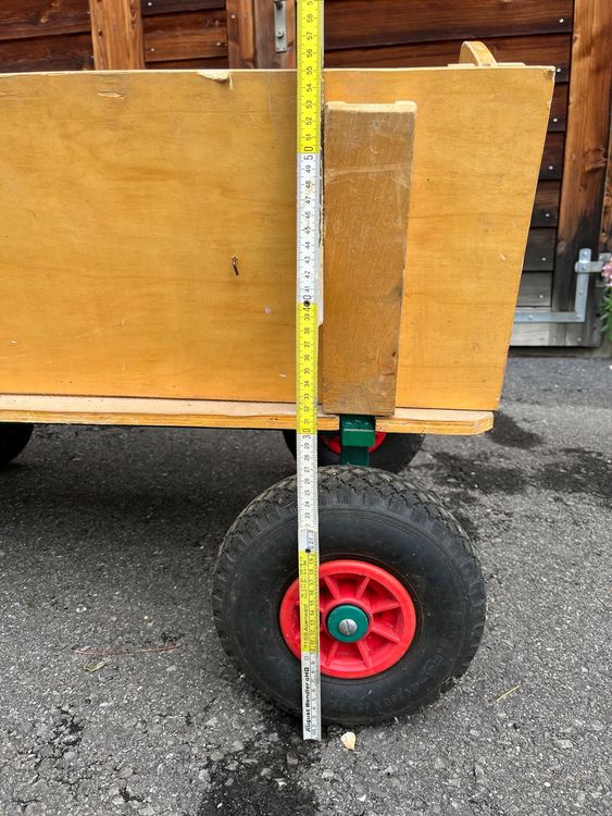  Foto zu Bollerwagen aus Holz mit Luftreifen 