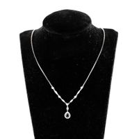 Weissgoldkette 18K mit Saphir und Diamanten