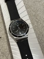 Montre Swatch automatique YIS413 Sistem51 (Tissot TAG)