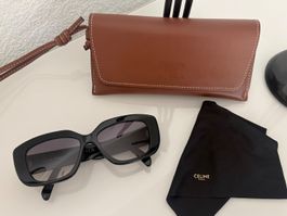 Céline Triomphe CL40216U Sonnenbrille Schwarz Gold Oversize