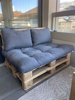 Salon de jardin en palettes avec coussins