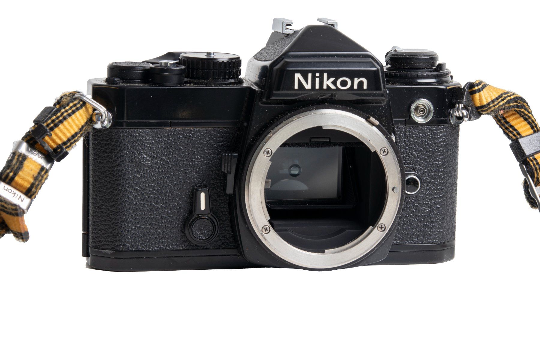 Nikon Fotocamera: NIKON FE Kamera Analog – Difettoso da Emmen venduto da chromaton