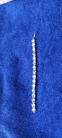 Armkette mit blauen Schmucksteinen