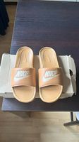 Claquettes Nike, pointure 39.