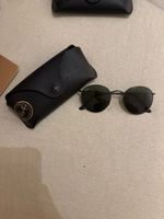 Lunettes de soleil Ray-Ban rondes noires avec étui