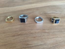4 Herrenringe aus Edelstahl – breit und schmal 